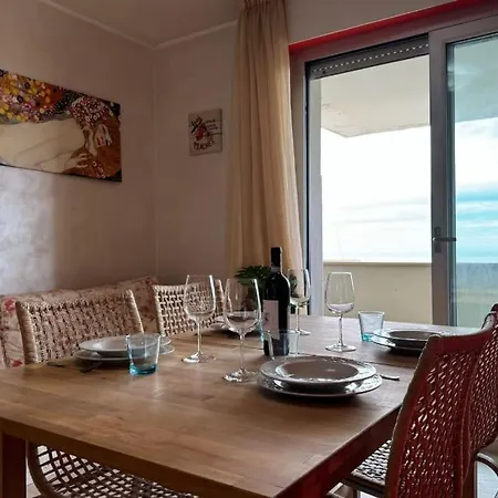 Апартаменты Terrazzo Prima Fila Mare Wi-fi Parcheggio *